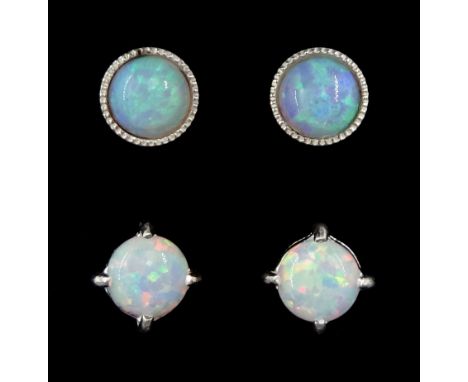 Two pairs of silver opal stud earrings