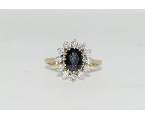 9ct gold ladies diamond and sapphire ring size O