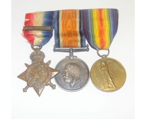 A mounted WW1 Mons Star with clasp medal trio named to T-21857 Driver W Thurston of the Army Service Corps