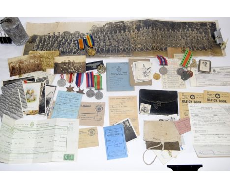Three groups of family medals covering both World Wars, plus photographs, marriage certificate, death certificate and other r