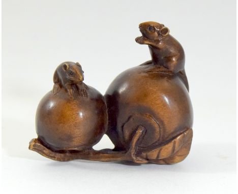 Japanese carved netsuke of two mice on peaches signed to the base