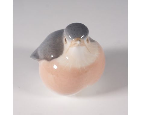 This charming Royal Copenhagen porcelain figurine features a "Fat Robin" bird, model number 2266. The hand-painted figurine s