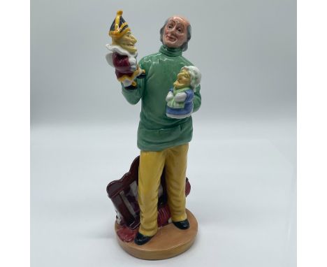 This Royal Doulton porcelain figurine, titled "Punch and Judy Man" (HN2765), was designed by William K. Harper. It portrays a