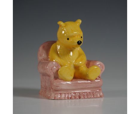 Charming Royal Doulton figurine from The Winnie the Pooh Collection, titled Winnie the Pooh in the Armchair, model WP4. This 