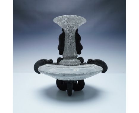 A striking ceramic art vessel featuring a distinctive crackle glaze in shades of gray and white, accentuated with sculptural 