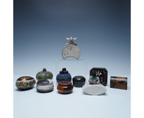 This collection features ten artisan-crafted lidded boxes, each showcasing unique designs, materials, and techniques. The ass
