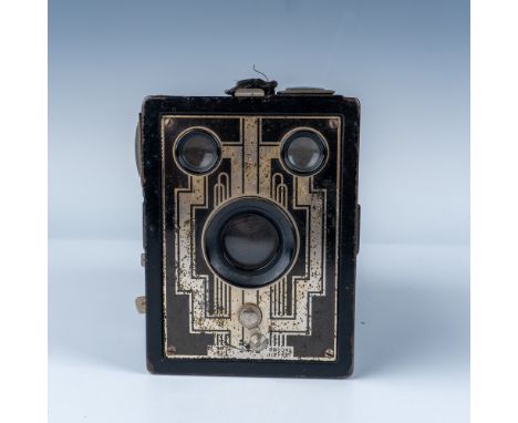 Vintage Kodak Brownie Junior Six-20 box camera featuring a classic Art Deco design on its metal front plate. Manufactured in 