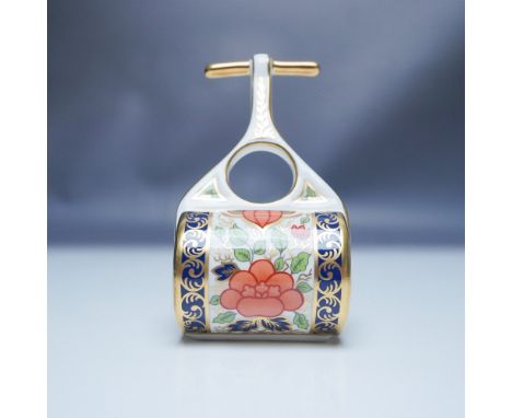 This exquisite Royal Crown Derby Mini Garden Roller figurine showcases the intricate Lotus Blossom pattern, adorned with vibr