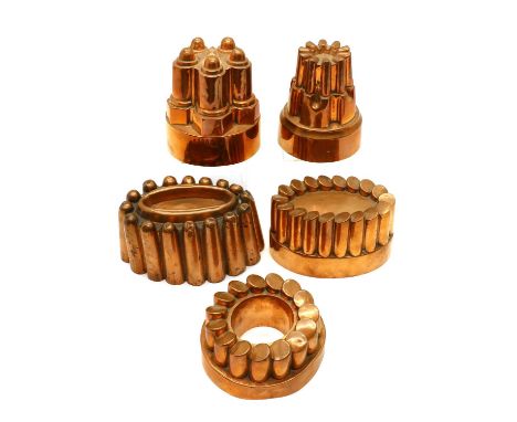 A collection of five Victorian copper jelly moulds,comprising three Benham &amp; Froud examples, the first numbered 467, 14cm