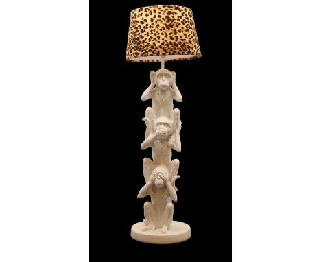 A 'Hear Speak See No Evil' table lamp,in white resin, with a faux leopard print shade, 78cm highCondition ReportWorking with 