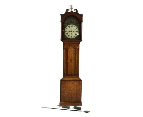 A George III oak and mahogany crossbanded longcase clock,with a painted arched dial, having subsidiary second and date dials,