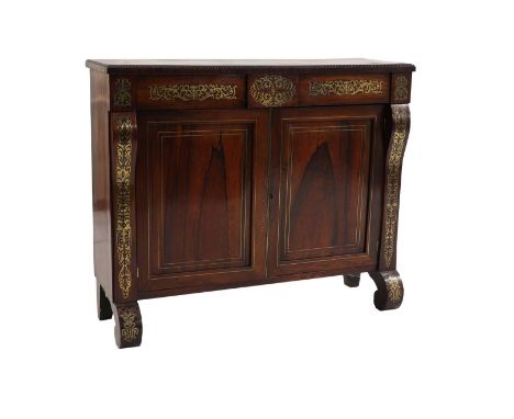 A Rosewood and brass side cabinet, first quarter of the 19th century, the rectangular top with a beaded edge, above two friez