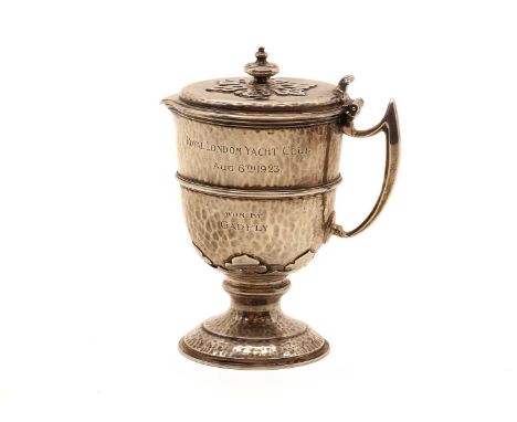 An Arts and Crafts silver ewer,by Johnson, Walker &amp; Tolburst, Sheffield 1923, of circular form, with hinged cover and scr