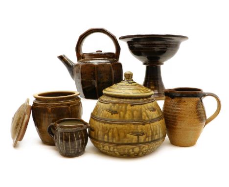 A group of studio pottery items,comprising a Mike Dodd tenmoku tea kettle, of faceted form, 20.2cm high, a Mike Dodd vase and