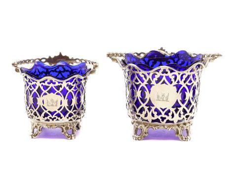 A near pair Victorian silver swing handled sugar baskets,by Joseph &amp; Albert Savory, London 1848, each of circular form, w