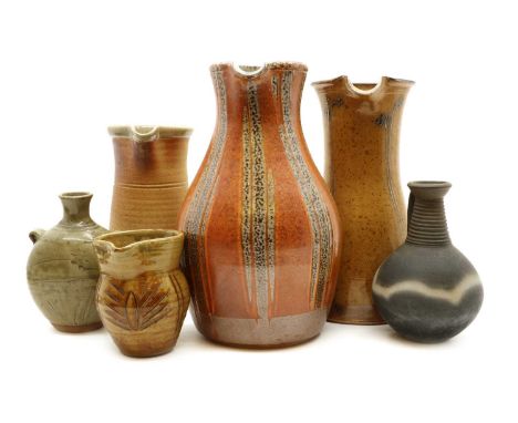 A group of studio pottery items,comprising a John Jelfs jug, glazed in tones of orange, 27cm high, a Toff Milway Conderton Po