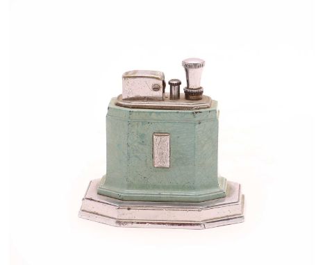 A Ronson touch-tip table lighter,with a chrome and enamelled body, 6.5cm wide9cm deep 8cm highCondition ReportKnocks, dents a