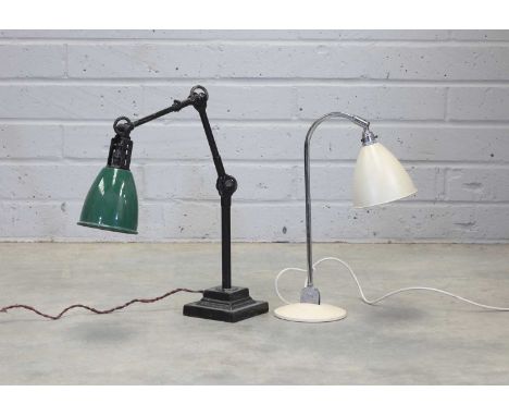 A Dougdill lamp, with a green shade, and a loaded mount, 55cm high,together with a Bestlite table lamp, in cream, 50cm high (