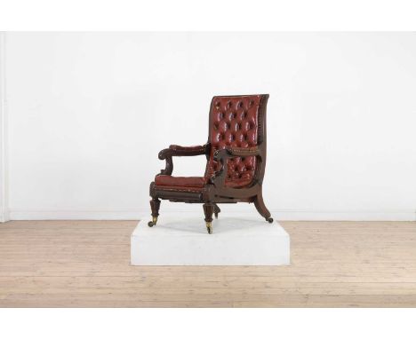 A George IV mahogany reclining armchair,c.1830, by Robert Daws of London, of 'Daws Patent' design, the upholstered red leathe
