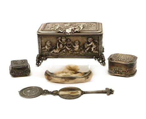A French silver-plated jewellery or toilet box,with crisply cast decoration and a hinged cover, stamped 'A.B. Paris',13cm wid