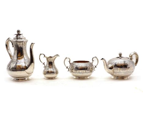 A Victorian silver four piece tea service,by Henry Wilkinson &amp; Co, London 1862, comprising a coffee pot, 18cm high, teapo