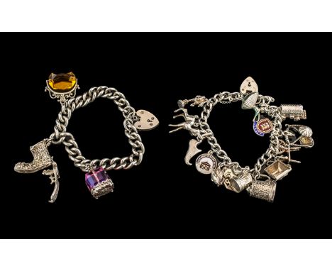 A Vintage Sterling Silver Charm Bracelet Loaded with 13 Silver Charms. All Marked for Silver 925. Includes Spinning Wheel, Yo