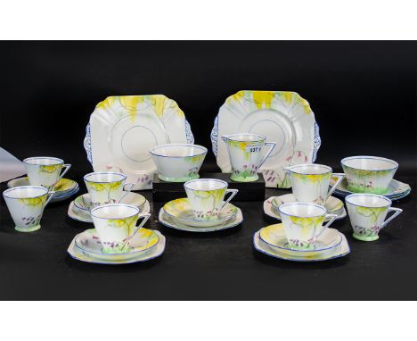 Art Deco Porcelain Tea Set, a fine quality painted set with floral decorations consisting of 8 side plates, 8 saucers, 7 cups