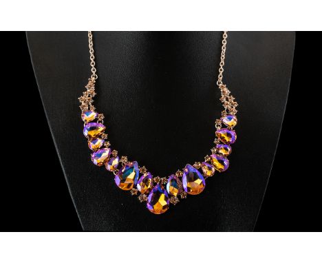 Champagne Gold to Purple Crystal Necklace, large and graduated pear shape crystals in a warm, champagne gold colour that flas