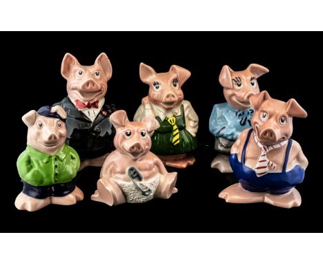 A Full Set of Wade Natwest Pigs to include cousin Wesley, all mint condition with original stoppers