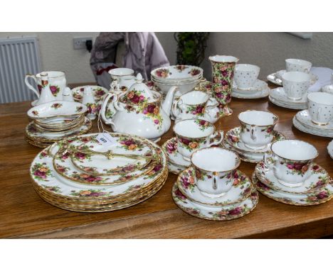 Old Country Roses Tea Service with many extras, comprising Tea Pot, Milk Jug, Lidded Sugar Bowl, four cups, saucers and side 