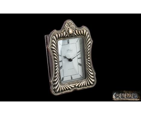 Silver Desk Clock with battery movement; clockmaker R Carr, England, hallmarked London 1960; 5.5 inches (13.75cms) high x 4 i