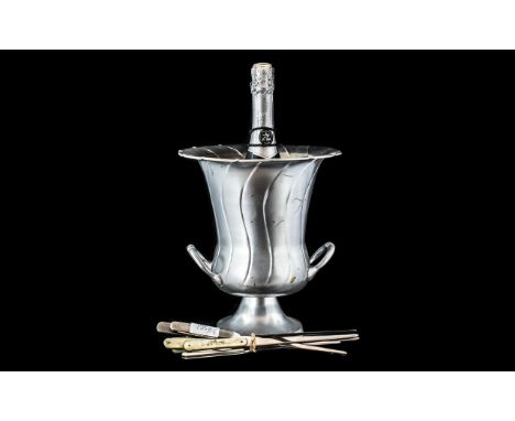 Alloy Champagne Bucket of Typical Form with carrying handles; 10 inches (25cms) high, plus eight desk letter openers (9)