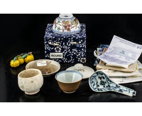 A Collection of Chinese Items to include an olive glazed saucer from The Treasure of Tek Sing, an egg shell porcelain bowl in