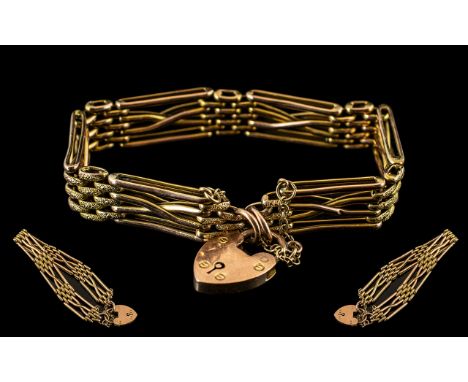 Ladies 9ct Gold Fancy 4 Bar Gate Bracelet with Heart Shaped Padlock. Fully Hallmarked for 9ct - 375. All Aspects of Condition