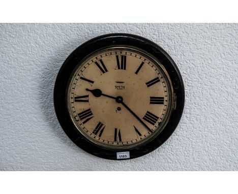 A Smiths 8-Day Circular School Clock, enamelled dial with Roman numerals.  Diameter 15".