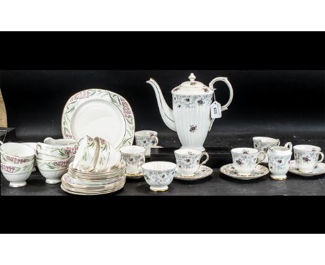 A Royal Stafford Enchantment Design Coffee Service comprising 6 tea cups and saucers along with a tea pot, cream/milk jug, an