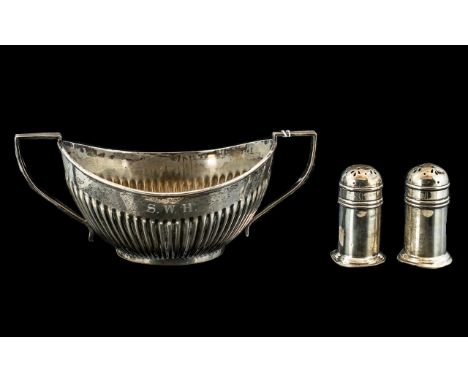A Collection of Four Silver Boxed Flatware to include 6 silver teaspoons, a spoon and fork and two sets of silver handled but