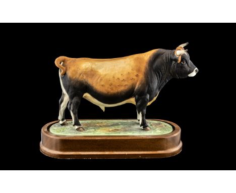 Royal Worcester - Superb Ltd Edition Hand Painted Ceramic Figure - Raised on a Wooden Plinth ' Jersey Bull ' Tail Up. RW3776A