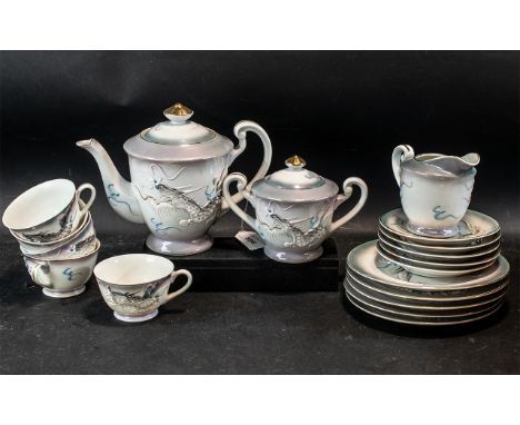 Oriental Tea Service, comprising tea pot, milk jug and sugar bowl, with five cups, saucers and side plates.  Imprint of Geish