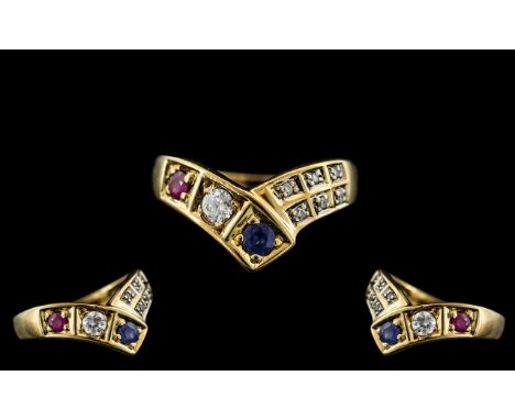 Ladies - 18ct Gold Ruby, Diamond and Sapphire Set Wishbone Ring. Marked 750 - 18ct to Interior of Shank. The Ruby, Diamond an