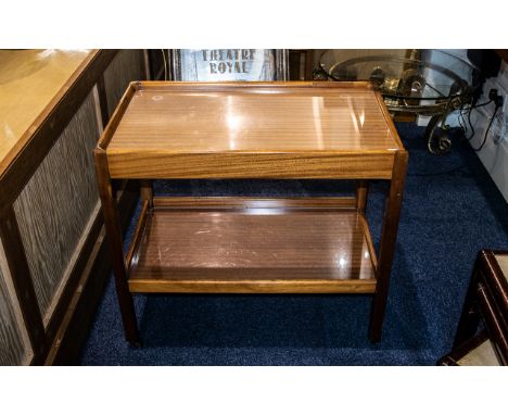 A Teak Two Shelf Trolley 1950's, raised on square legs with casters, height 26.5'' x 29.5 length x 18'' depth.