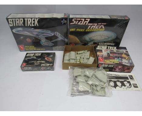Four boxed AMT / ERTL Star Trek plastic model kits comprising #6007 U.S.S. Enterprise Command Bridge, #6677 Space Ship Set, #
