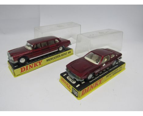 Two perspex cased Dinky diecast model cars to include 128 Mercedes-Benz 600 and 190 Monteverdi 375L with Speedwheels (2) 