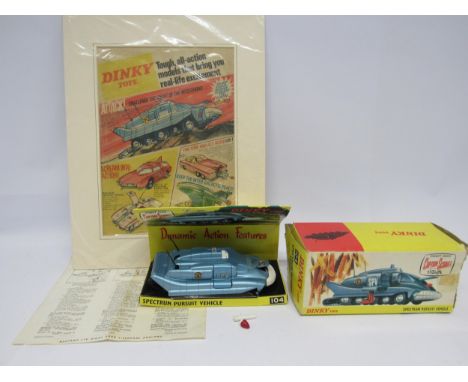 A boxed diecast Dinky Toys 104 Captain Scarlet Spectrum Pursuit Vehicle with intact aerials, plastic figure, missile (damaged
