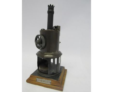 An early 20th Century live steam vertical stationary engine, raised on pine plinth with plaque "Noris", possibly by Ernst Pla