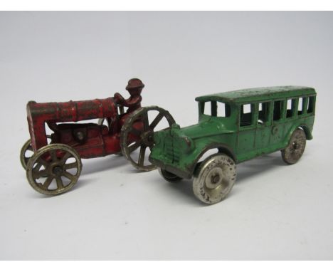 Two Arcade, US, cast iron model vehicles to include 312 bus and 273R tractor (2) 