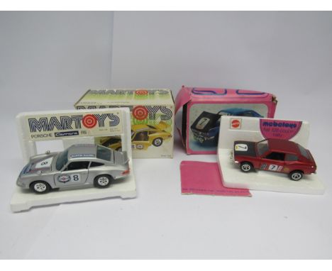 A boxed Mattel Mebetoys 1:25 scale diecast Fiat 128 Coupe Rally (box worn, one flap detached) and a boxed Martoys 1:24 scale 