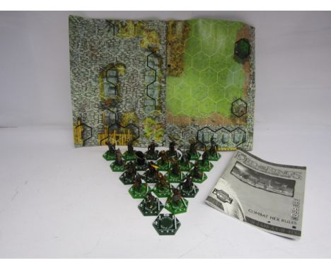 An unboxed The Lord Of The Rings Combat Hex Tradeable Miniatures Game comprising twenty one figures, playing mat and rule boo