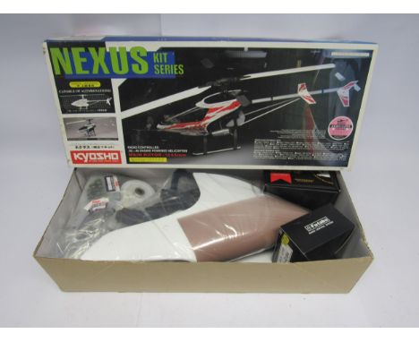 A boxed Kyosho Nexus Kit Series no. 21705 Nexus 30 radio controlled engine powered helicopter model kit, unassembled, appeari