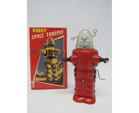 A modern boxed tinplate Robot Space Trooper with crank-handle friction motor 